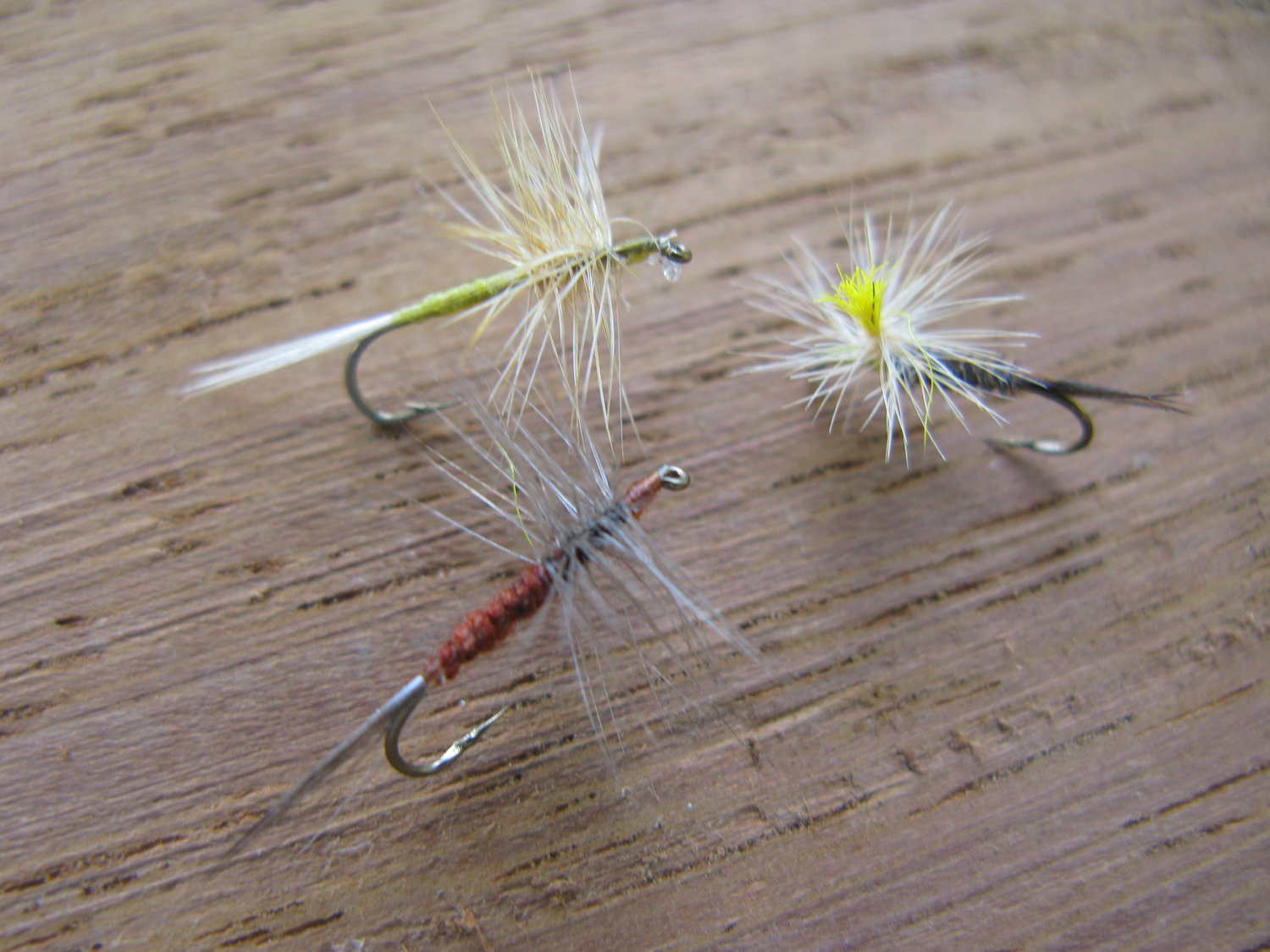 A Rusty Spinner, Pale Evening Spinner, and Pheasant Tail, Parachute Nymph—patterns that work when others do not.